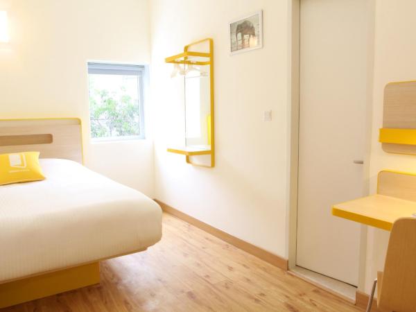 Bloomrooms @ Link Road : photo 1 de la chambre chambre standard lit queen-size