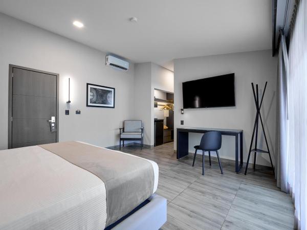 Hotel Estancia Business Class : photo 3 de la chambre suite junior deluxe