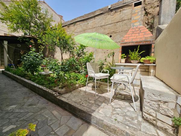 Dino and Jele Apartments : photo 7 de la chambre chambre double - vue sur jardin