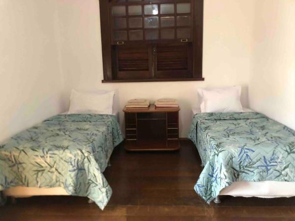 Casa Amarela : photo 2 de la chambre chambre double ou lits jumeaux avec salle de bains privative