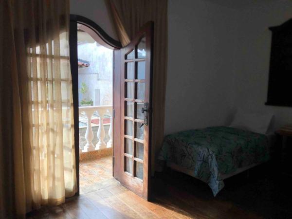 Casa Amarela : photo 4 de la chambre chambre double ou lits jumeaux avec salle de bains privative