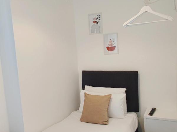 Central Wave : photo 1 de la chambre chambre simple avec salle de bains commune