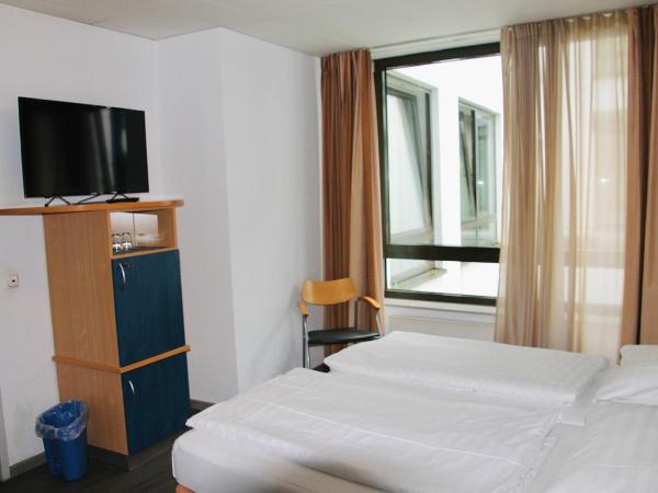 Opera Hotel Köln : photo 5 de la chambre chambre double ou lits jumeaux