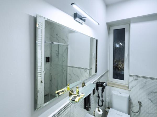 Elegant Apartments : photo 5 de la chambre chambre simple avec salle de bains extérieure privative