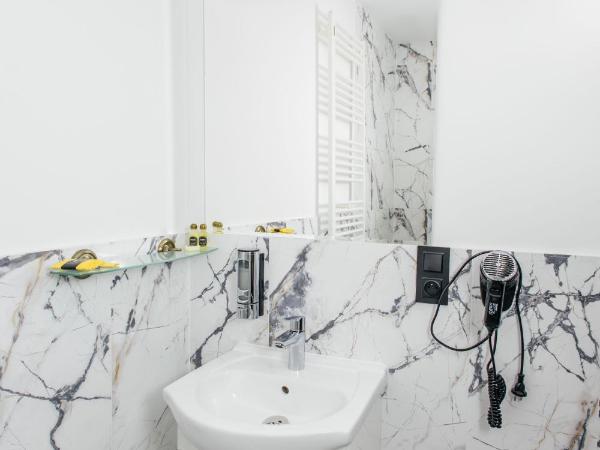 Elegant Apartments : photo 10 de la chambre chambre simple avec salle de bains