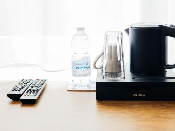 Elegant Apartments : photo 8 de la chambre chambre simple avec salle de bains