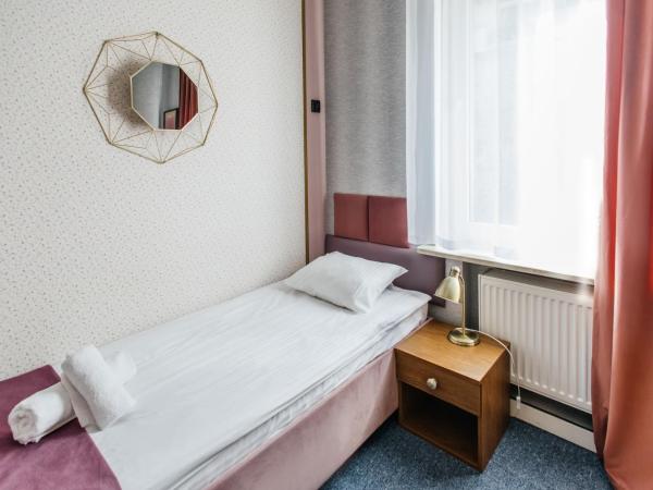 Elegant Apartments : photo 3 de la chambre chambre simple avec salle de bains