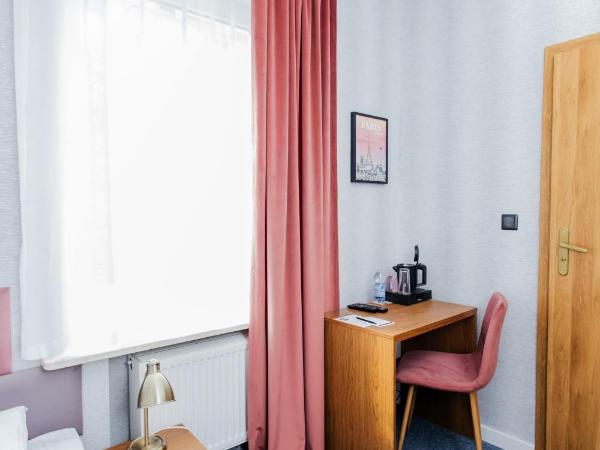 Elegant Apartments : photo 2 de la chambre chambre simple avec salle de bains