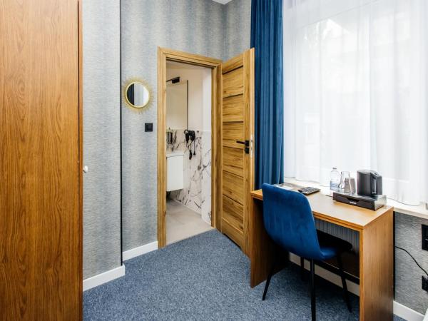 Elegant Apartments : photo 5 de la chambre chambre simple avec salle de bains