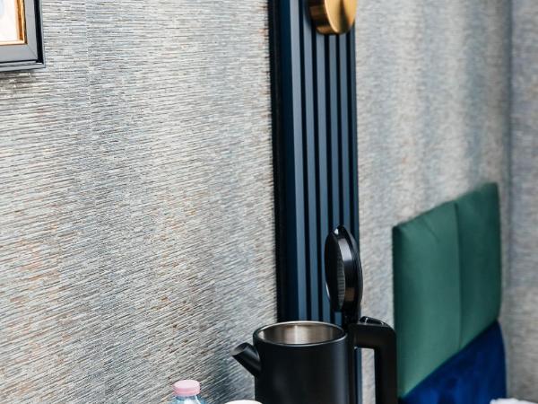 Elegant Apartments : photo 9 de la chambre chambre lits jumeaux avec salle de bains privative