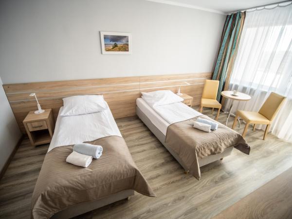 Sanatorium Perla Baltyku : photo 4 de la chambre chambre lits jumeaux confort - vue sur mer