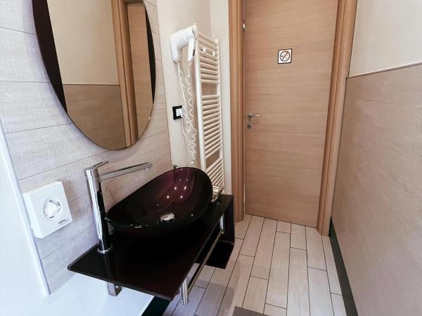 Colorado Home : photo 6 de la chambre chambre double ou lits jumeaux avec salle de bains privative externe