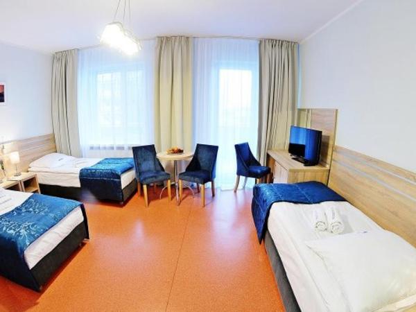 Sanatorium Muszelka : photo 2 de la chambre chambre triple standard