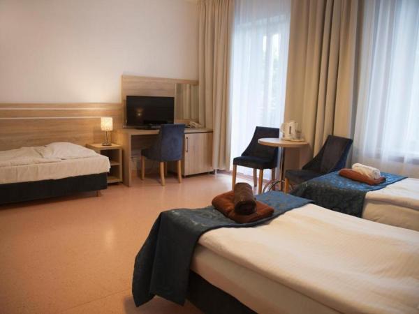 Sanatorium Muszelka : photo 3 de la chambre chambre triple standard