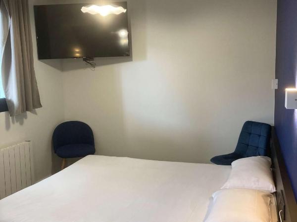Brit Hotel Saint-Nazaire Centre : photo 1 de la chambre chambre quadruple