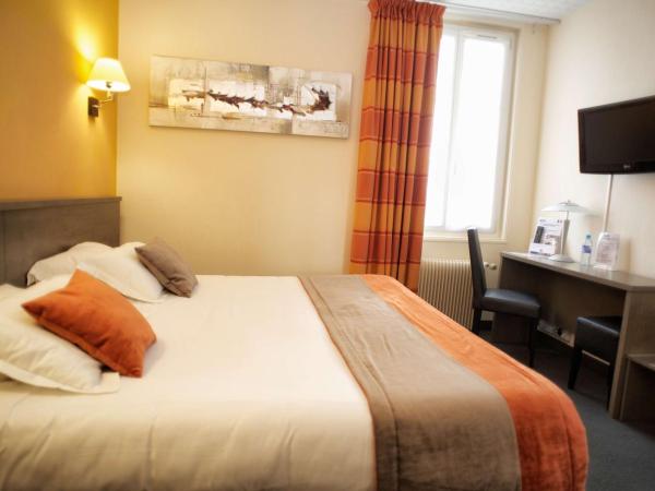 Brit Hotel Le Surcouf : photo 1 de la chambre chambre double supérieure avec lit king-size