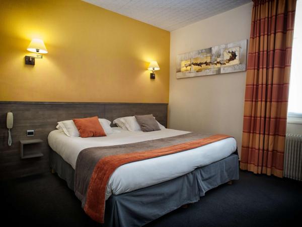 Brit Hotel Le Surcouf : photo 2 de la chambre chambre double supérieure avec lit king-size