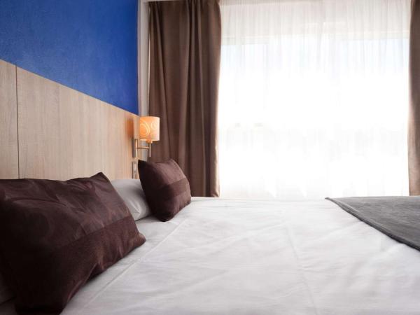 Brit Hôtel De L'océan : photo 3 de la chambre hébergement familial en duplex - vue sur ville