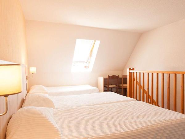 Brit Hôtel De L'océan : photo 1 de la chambre hébergement familial en duplex - vue sur ville