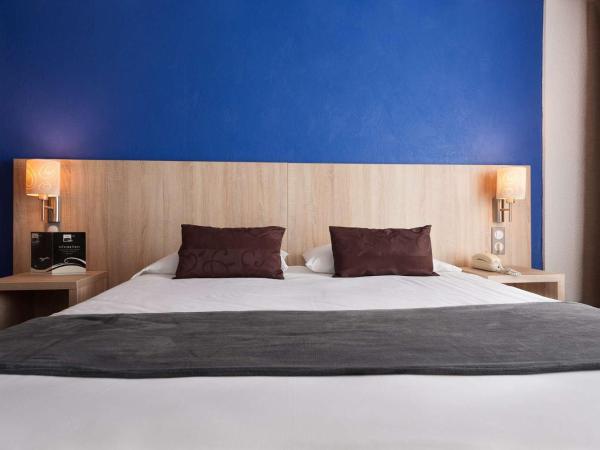 Brit Hôtel De L'océan : photo 6 de la chambre hébergement familial en duplex - vue sur ville