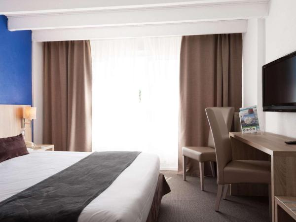 Brit Hôtel De L'océan : photo 4 de la chambre hébergement familial en duplex - vue sur ville