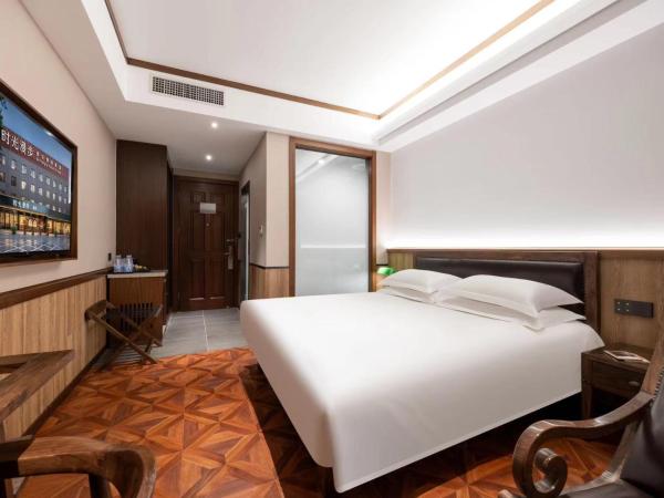 Time Traveller Hotel - Near Beijing Panjiayuan Antique Market, Beijing Happy Valley, CBD, China Zun and Sanlitun, Tian'anmen Square, Free ice cream, mineral water, coffee, snacks and laundry service, Free gymnastic, English communication well : photo 3 de la chambre chambre double deluxe