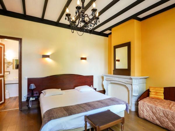 Brit Hotel Notre Dame : photo 1 de la chambre chambre double supérieure avec baignoire