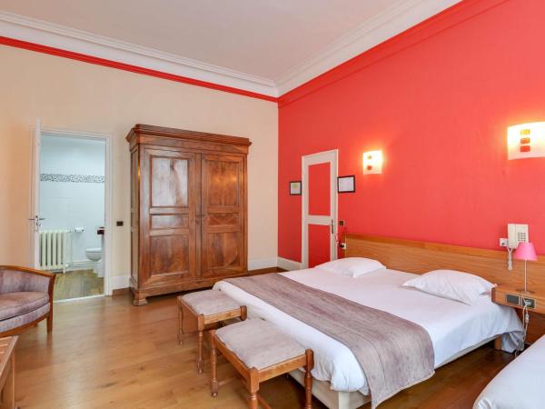 Brit Hotel Notre Dame : photo 2 de la chambre chambre familiale