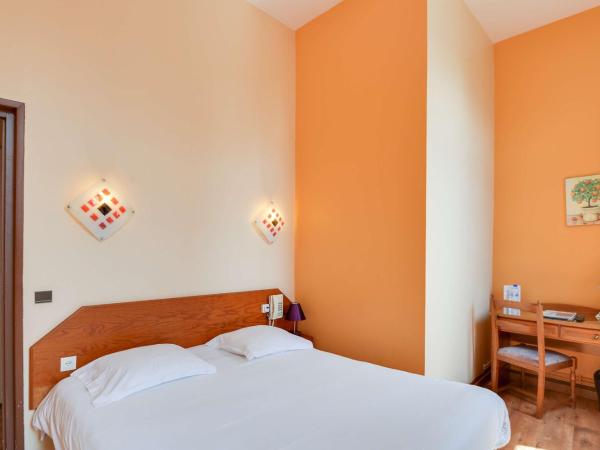 Brit Hotel Notre Dame : photo 5 de la chambre chambre double supérieure avec baignoire