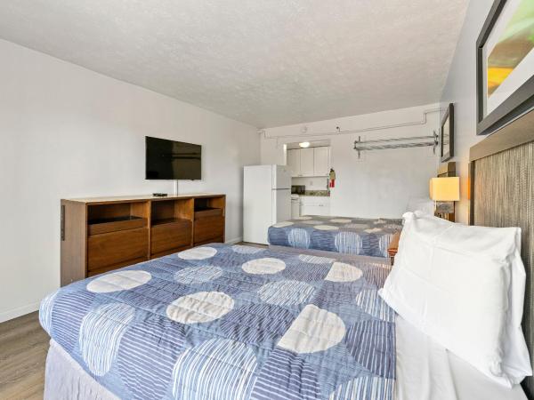 Budgetel Inn and Suites : photo 4 de la chambre deluxe double room with kitchen