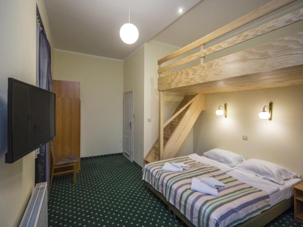 Willa Excelsior : photo 1 de la chambre chambre quadruple avec mezzanine