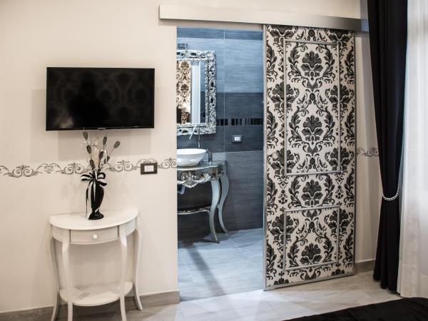 Dolci Mura Luxury Rooms : photo 6 de la chambre chambre double avec salle de bains privative