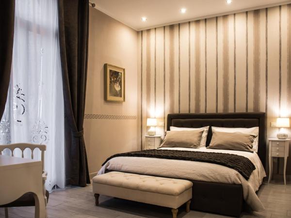 Dolci Mura Luxury Rooms : photo 4 de la chambre chambre triple avec salle de bains privative
