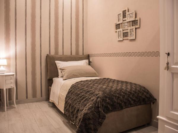 Dolci Mura Luxury Rooms : photo 6 de la chambre chambre triple avec salle de bains privative