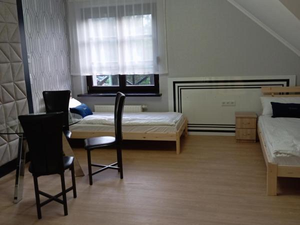 Aparthotel Kontrast : photo 1 de la chambre suite familiale