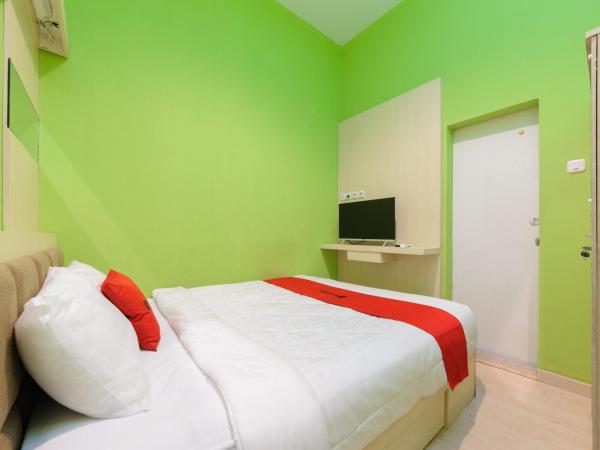 Urbanview Hotel Salam Raya Palmerah by RedDoorz : photo 2 de la chambre chambre double standard