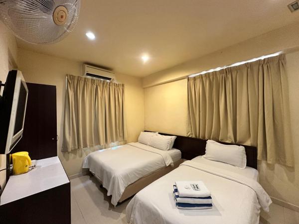 Anggerik Lodging : photo 7 de la chambre cendana quadruple room