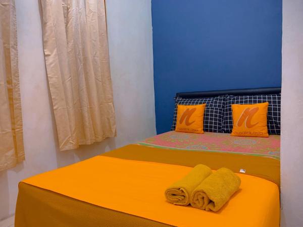 Guest House Natasya Priok by Nusalink : photo 1 de la chambre chambre double