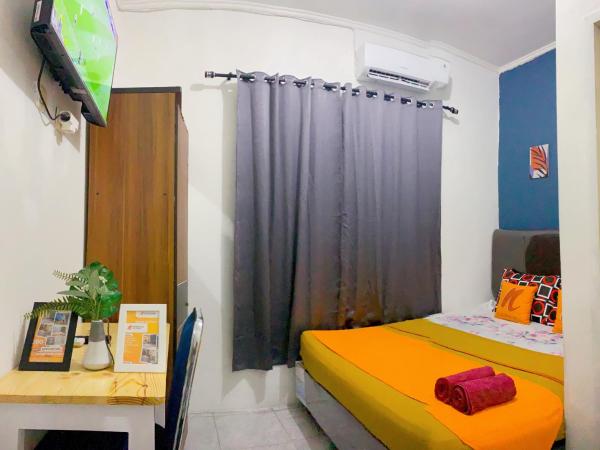 Guest House Natasya Priok by Nusalink : photo 8 de la chambre chambre double