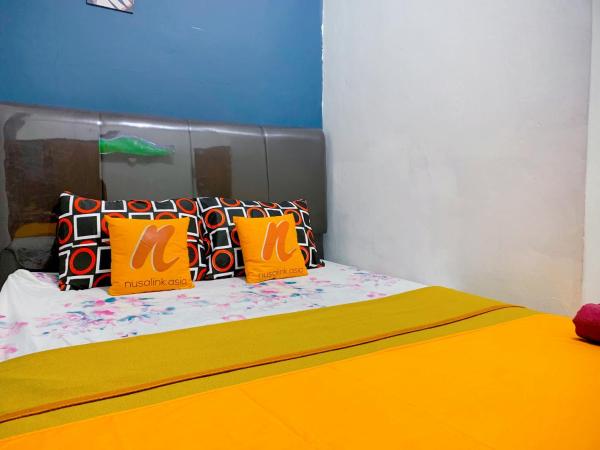 Guest House Natasya Priok by Nusalink : photo 5 de la chambre chambre double