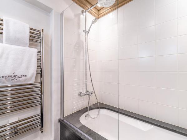 Hôtel Les Peupliers : photo 1 de la chambre chambre privilège avec balcon - vue sur lac