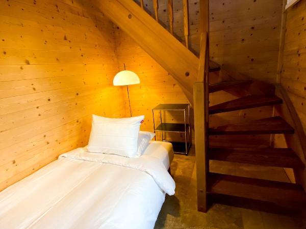 Chalet 4 Saisons - Guesthouse : photo 10 de la chambre suite junior familiale