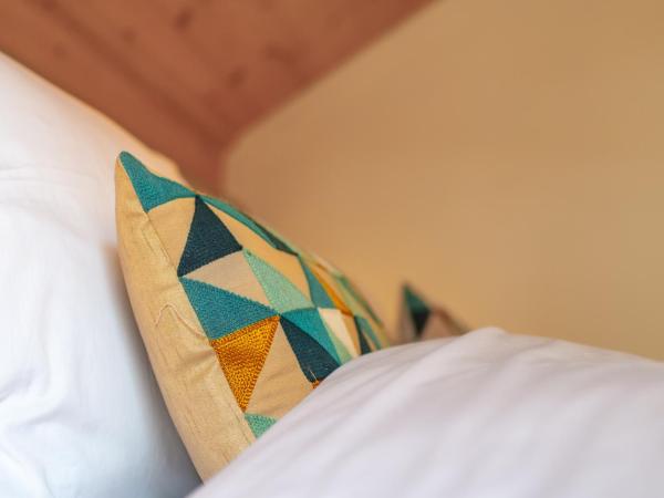 Chalet 4 Saisons - Guesthouse : photo 2 de la chambre suite familiale