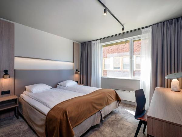 Quality Hotel Saga : photo 10 de la chambre chambre double ou lits jumeaux standard