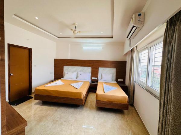 Sln Pride Boarding and Lodging : photo 1 de la chambre chambre triple deluxe