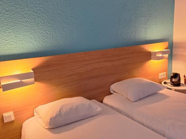 Brit Hotel Essentiel Tours Nord : photo 1 de la chambre chambre lits jumeaux