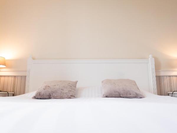 Manoir 1685 Saint Malo : photo 9 de la chambre chambre lit king-size deluxe
