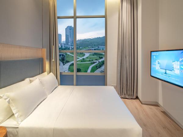 Wuyu Hotel - Chongqing Liangjiang Happiness Plaza : photo 1 de la chambre chambre lit queen-size deluxe