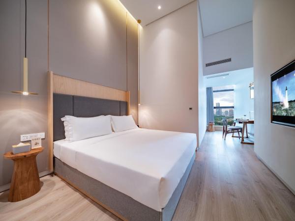 Wuyu Hotel - Chongqing Liangjiang Happiness Plaza : photo 1 de la chambre chambre double deluxe (2 adultes + 1 enfant)