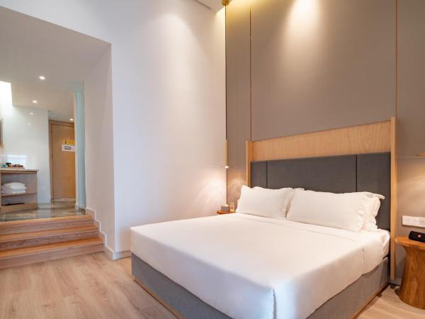 Wuyu Hotel - Chongqing Liangjiang Happiness Plaza : photo 2 de la chambre chambre double deluxe (2 adultes + 1 enfant)